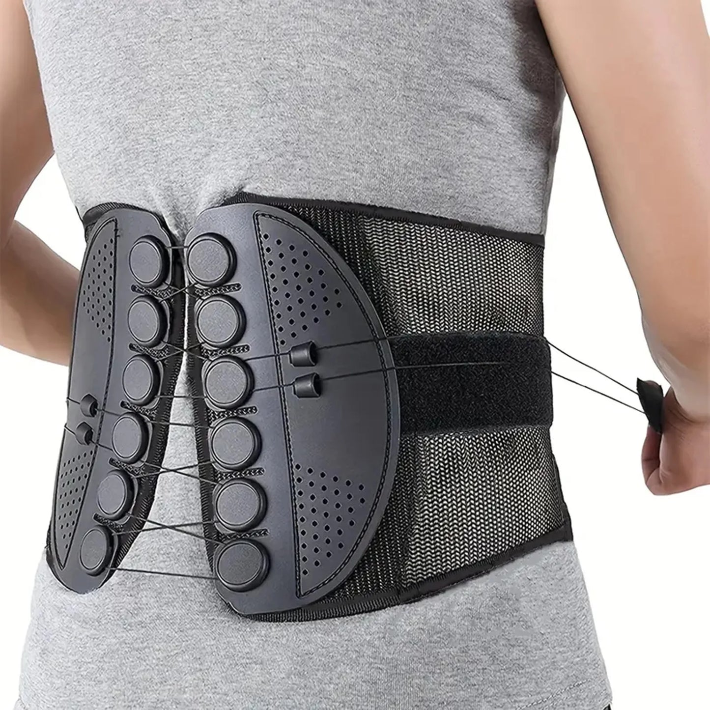 Black back brace worn by a person on a white background