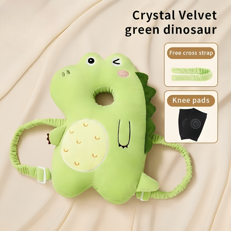 Green dinosaur-shaped pillow with straps on a beige background