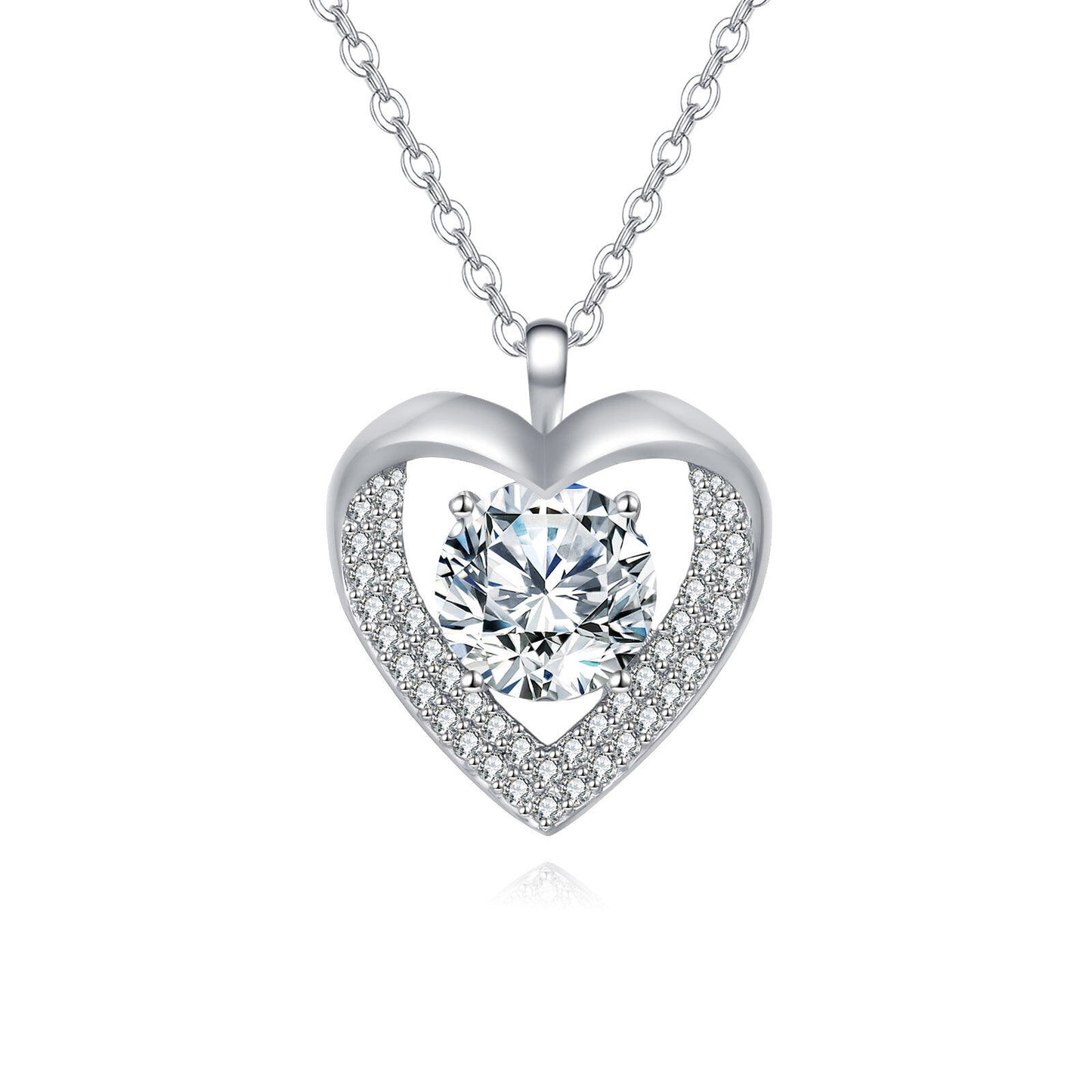 Heart-shaped silver necklace with a central gemstone on a white background
