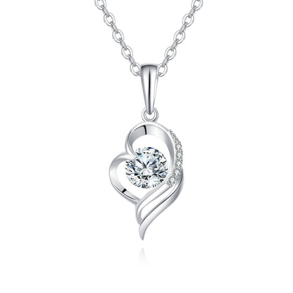 Silver heart-shaped pendant necklace on a white background