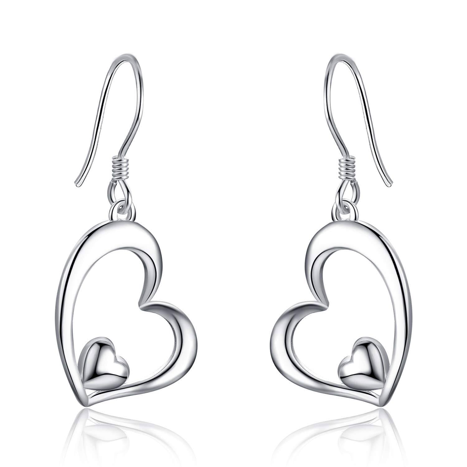 Silver heart-shaped earrings on a white background