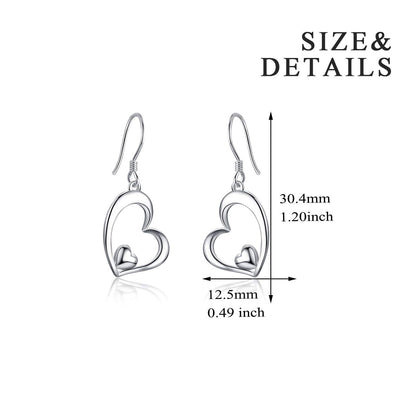 Heart-shaped earrings with size and detail measurements on a white background
