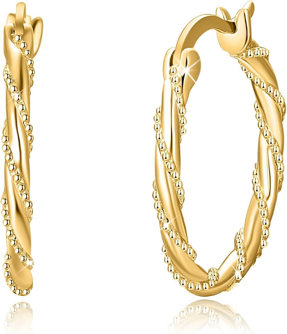 Gold hoop earrings with twisted design on a white background