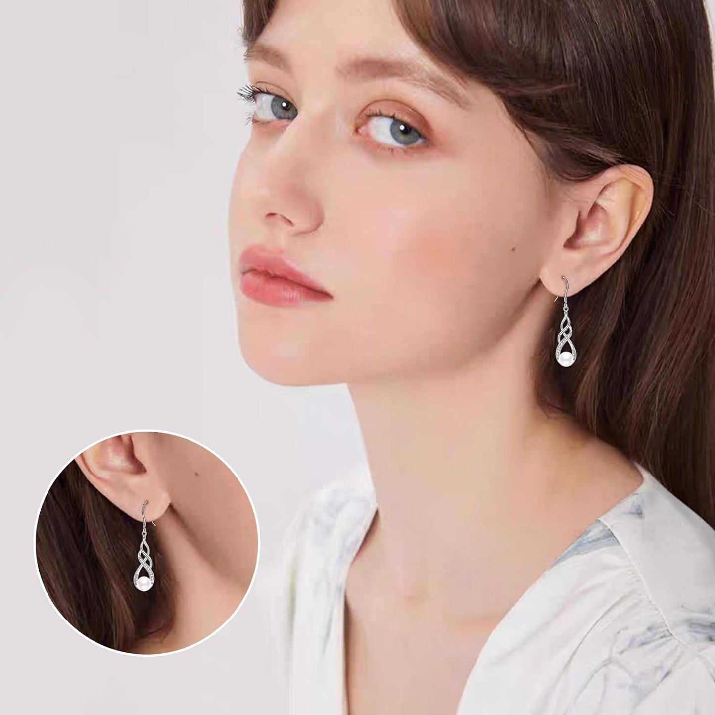 Woman wearing silver earrings with a close-up inset on a plain background