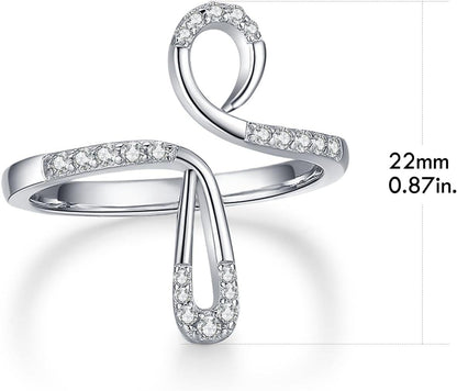 Silver adjustable ring with gemstones on a white background