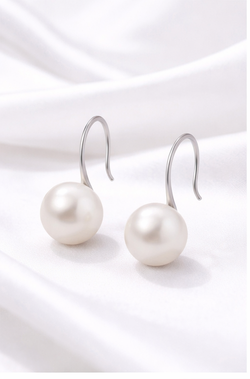 pearl earrings on a white background