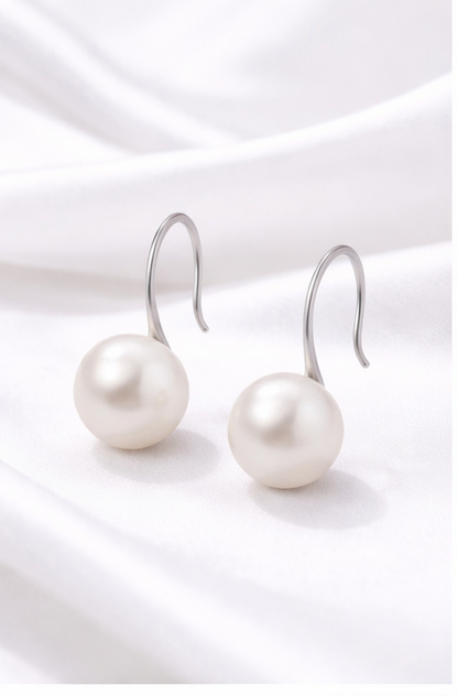 pearl earrings on a white background