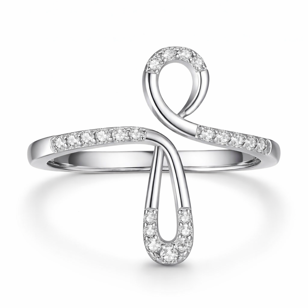 Silver ring with diamond accents on a white background