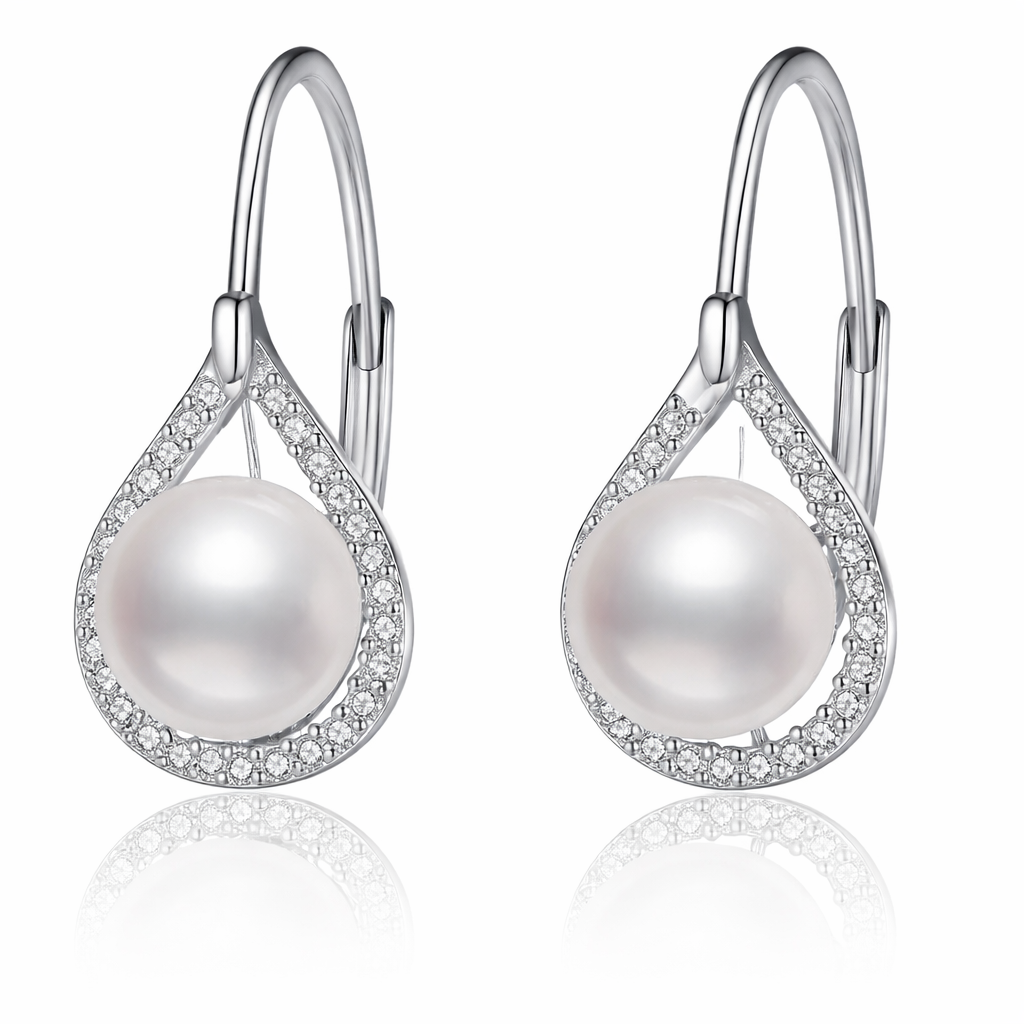 Pearl earrings with silver hooks on a white background