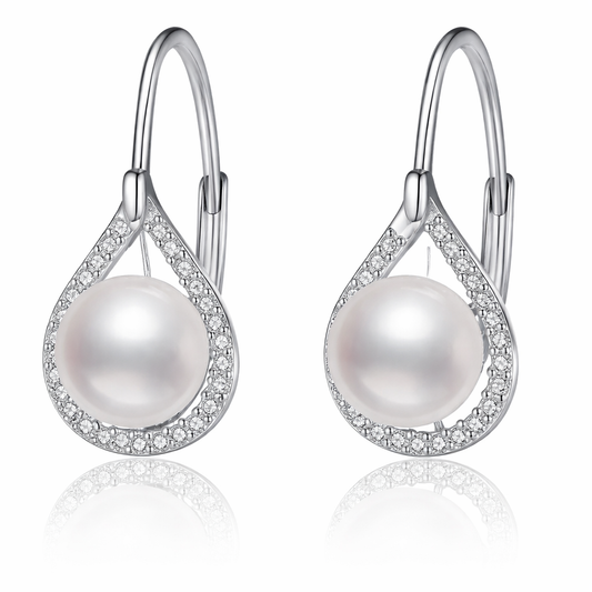 Pearl earrings with silver hooks on a white background