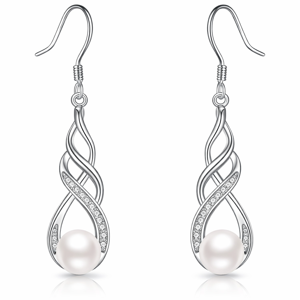 Silver earrings with pearls on a white background