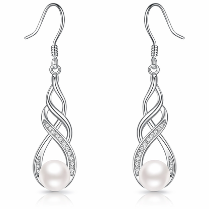 Silver earrings with pearls on a white background