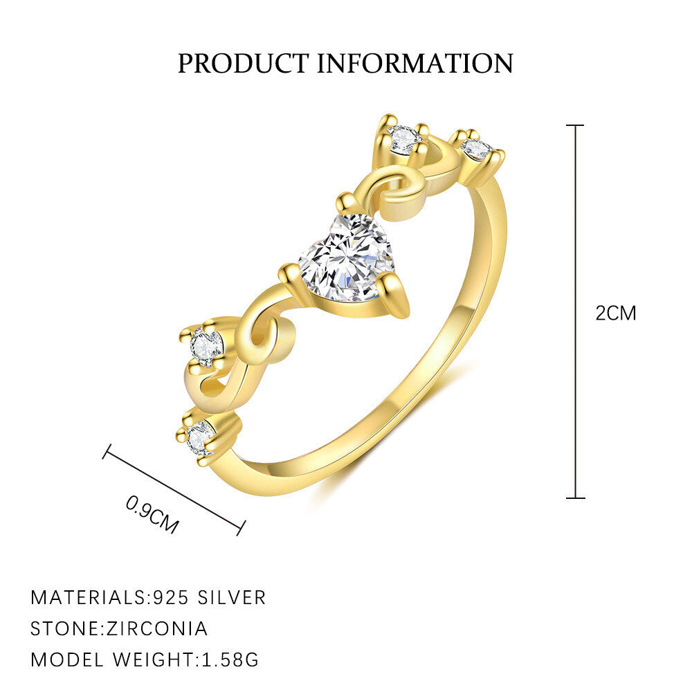 Gold ring with zirconia stones and product information on a white background