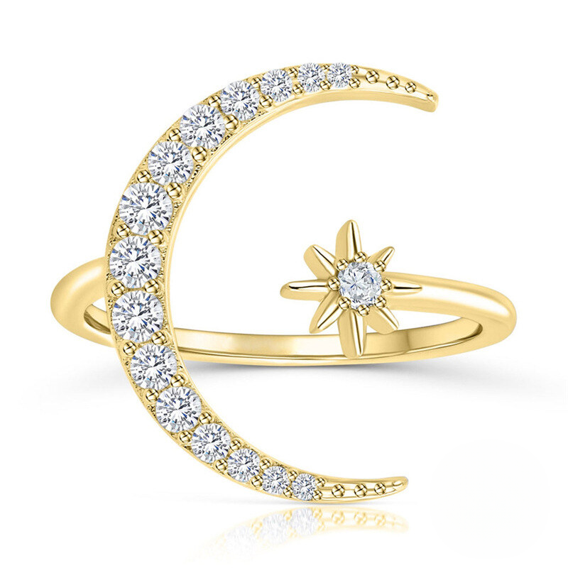 Gold ring with diamond accents on a white background