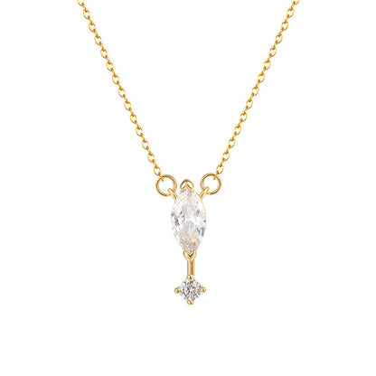 Gold necklace with a diamond pendant on a white background