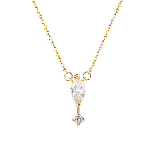 Gold necklace with a diamond pendant on a white background
