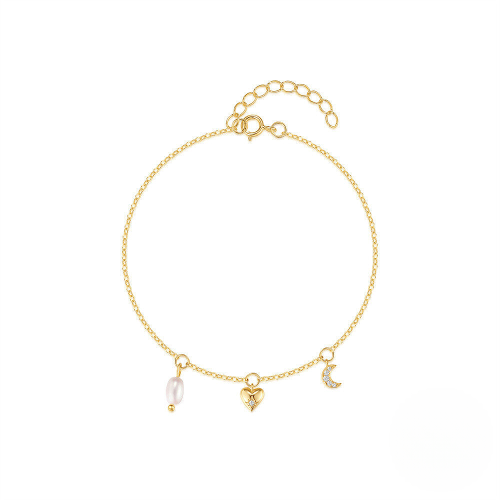 Gold bracelet with heart and moon charms on a white background