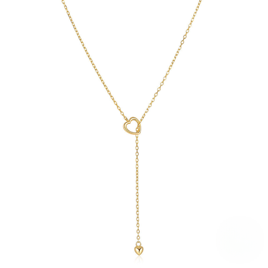 Gold necklace with heart pendants on a white background