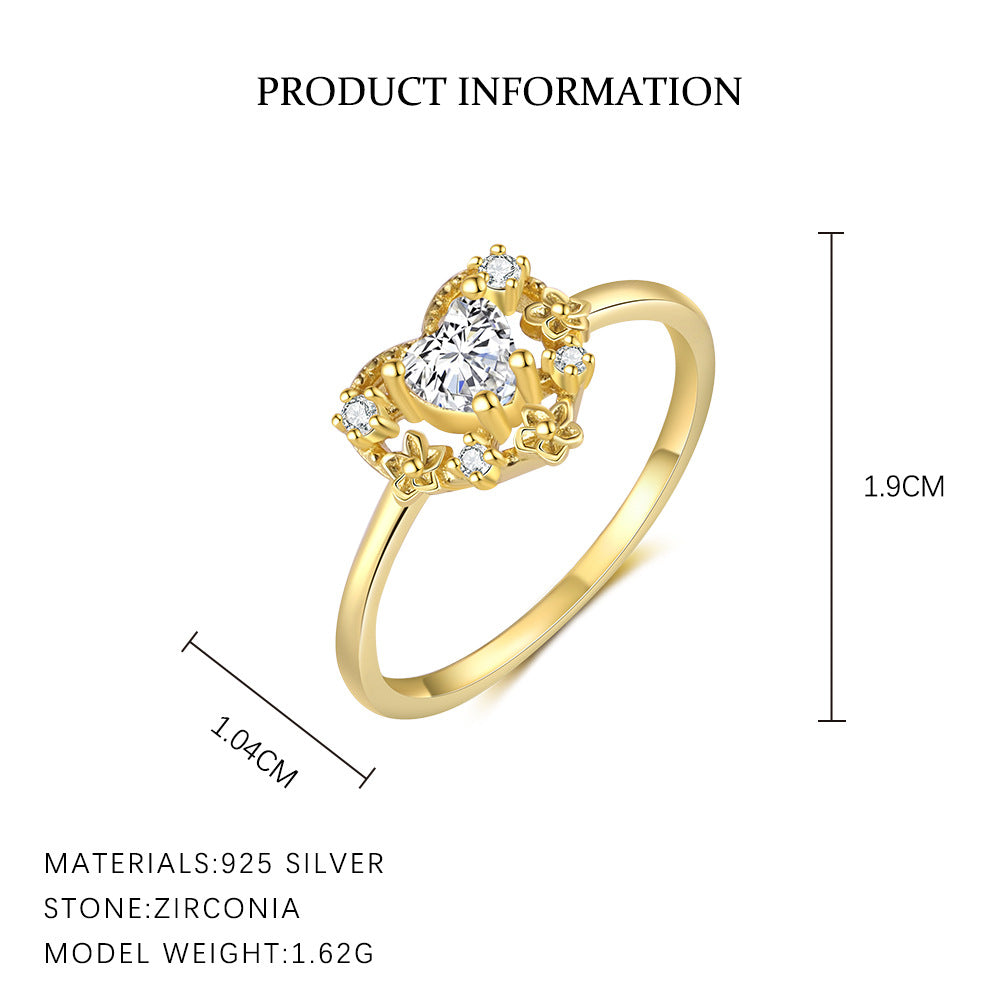 Gold ring with zirconia stones and product information on a white background