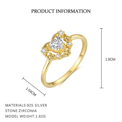 Gold ring with zirconia stones and product information on a white background