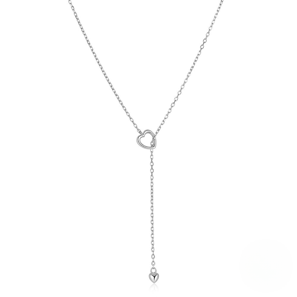 Silver necklace with heart pendants on a white background