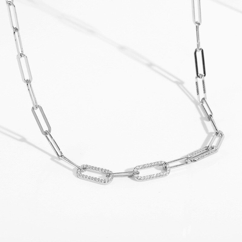 Silver chain necklace on a white background
