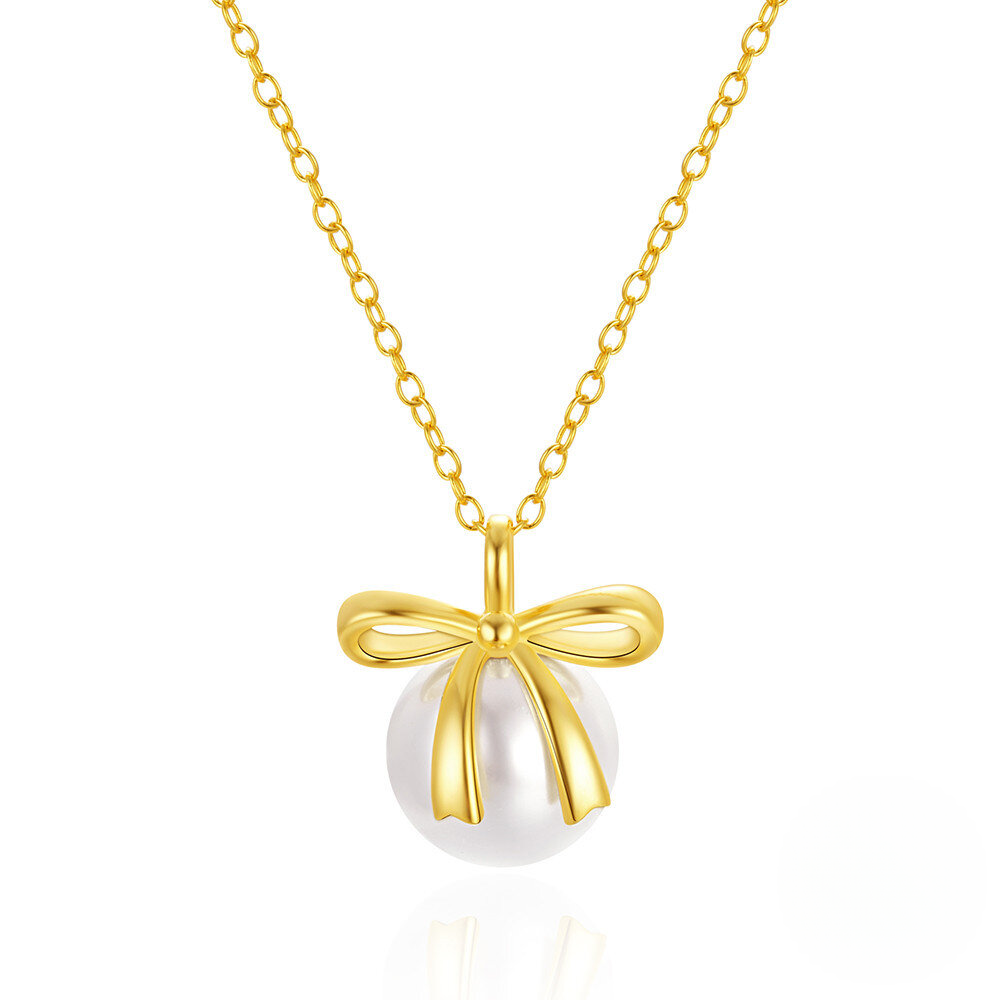 Gold necklace with a bow and pearl pendant on a white background