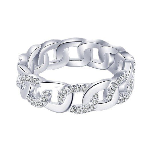 Silver chain ring with diamond accents on a white background
