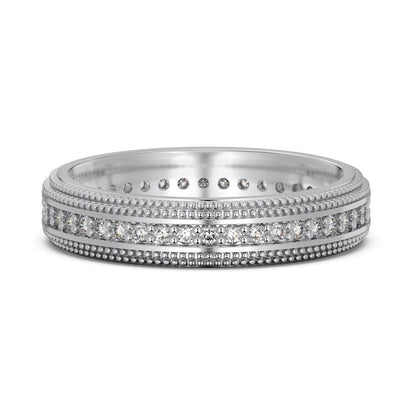 Silver ring with diamond accents on a white background