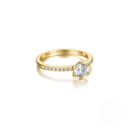 Gold ring with a diamond on a white background