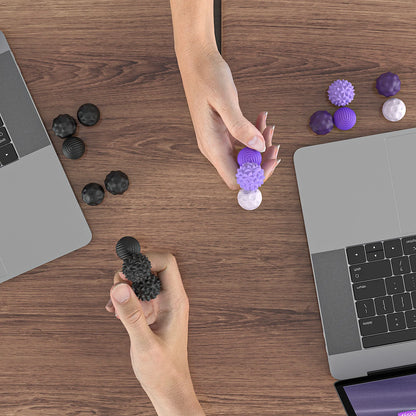 ChromaClick magnetic fidget roller in hand showing textured silicone surface