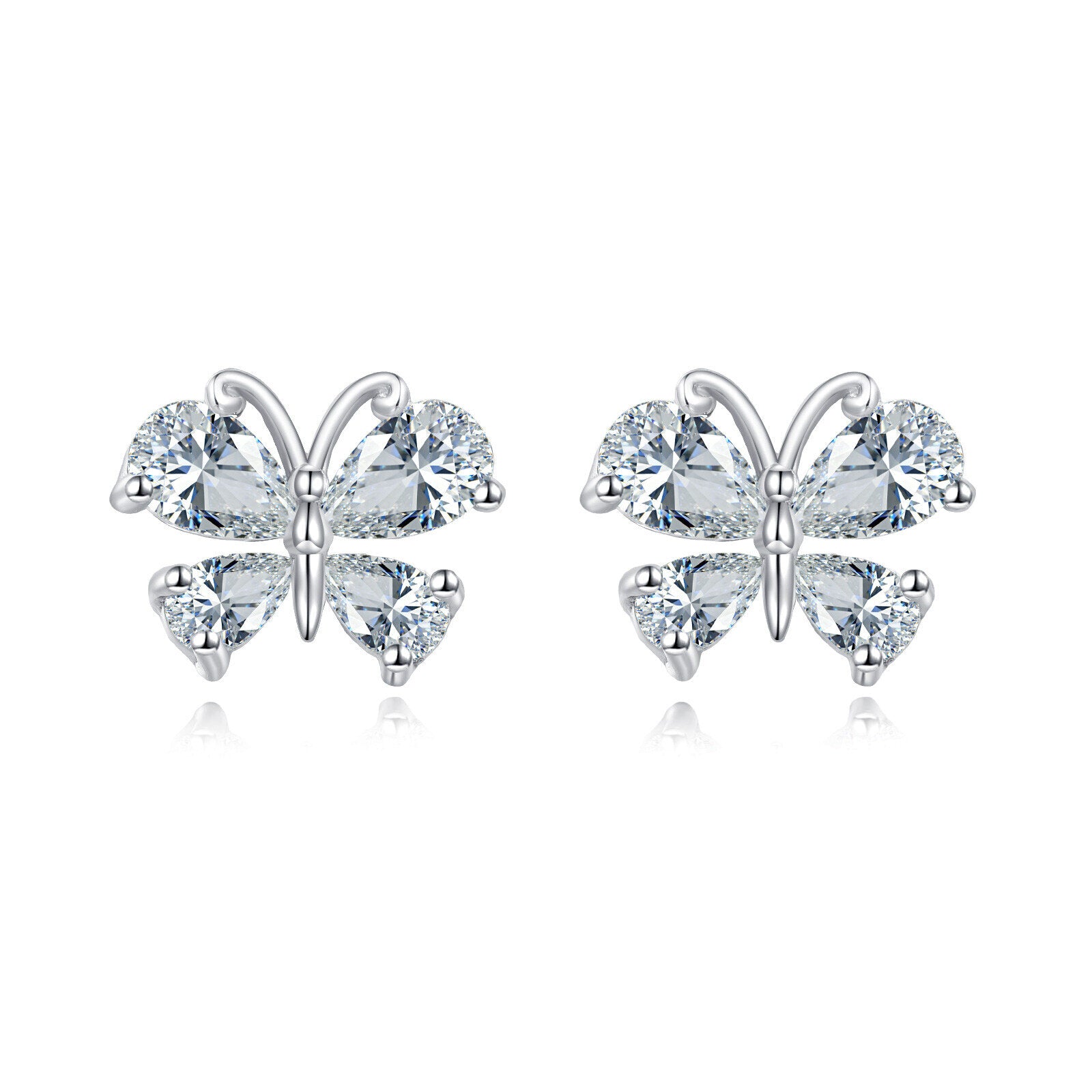 Butterfly-shaped earrings with clear gemstones on a white background