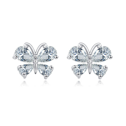 Butterfly-shaped earrings with clear gemstones on a white background