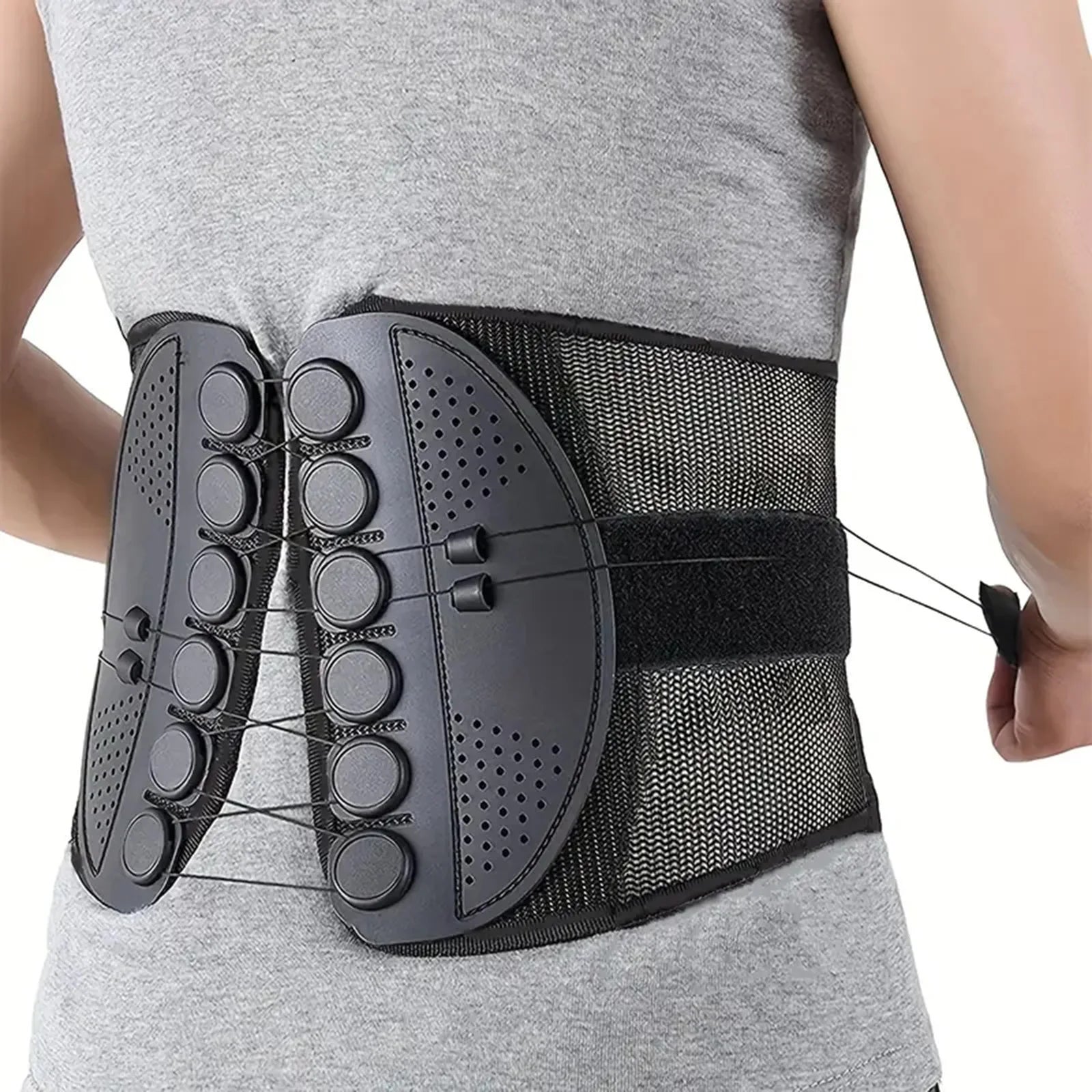 Black back brace worn by a person on a white background