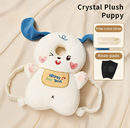 Crystal Plush Puppy toy with blue ears and a cross strap on a beige background