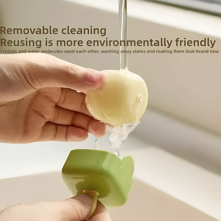 Hand holding a green cleaning tool with water being poured over it, text about environmental friendliness.